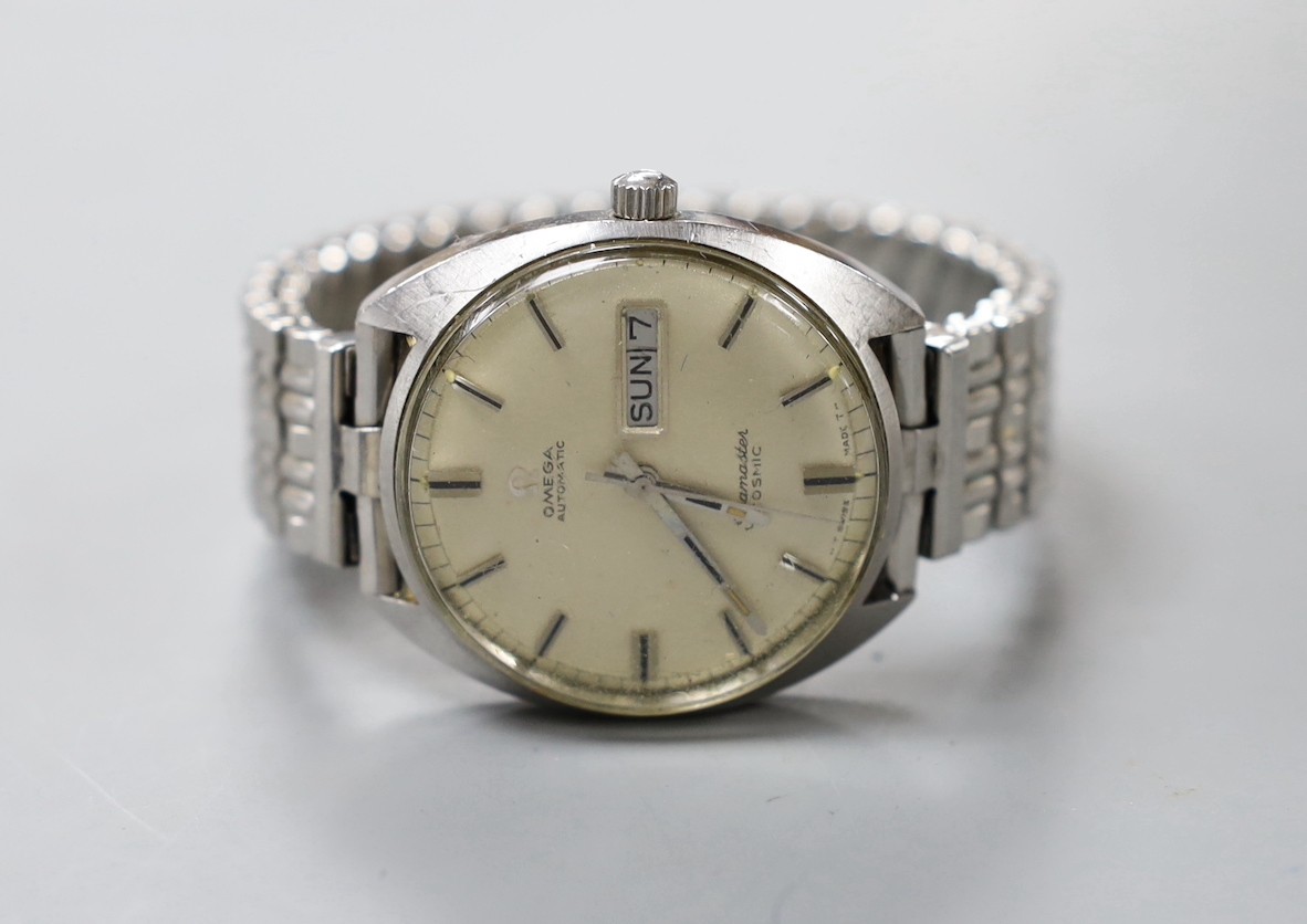 A gentleman's stainless steel Omega Seamaster Cosmic automatic wrist watch, the case back engraved with name and date, on associated flexible bracelet.